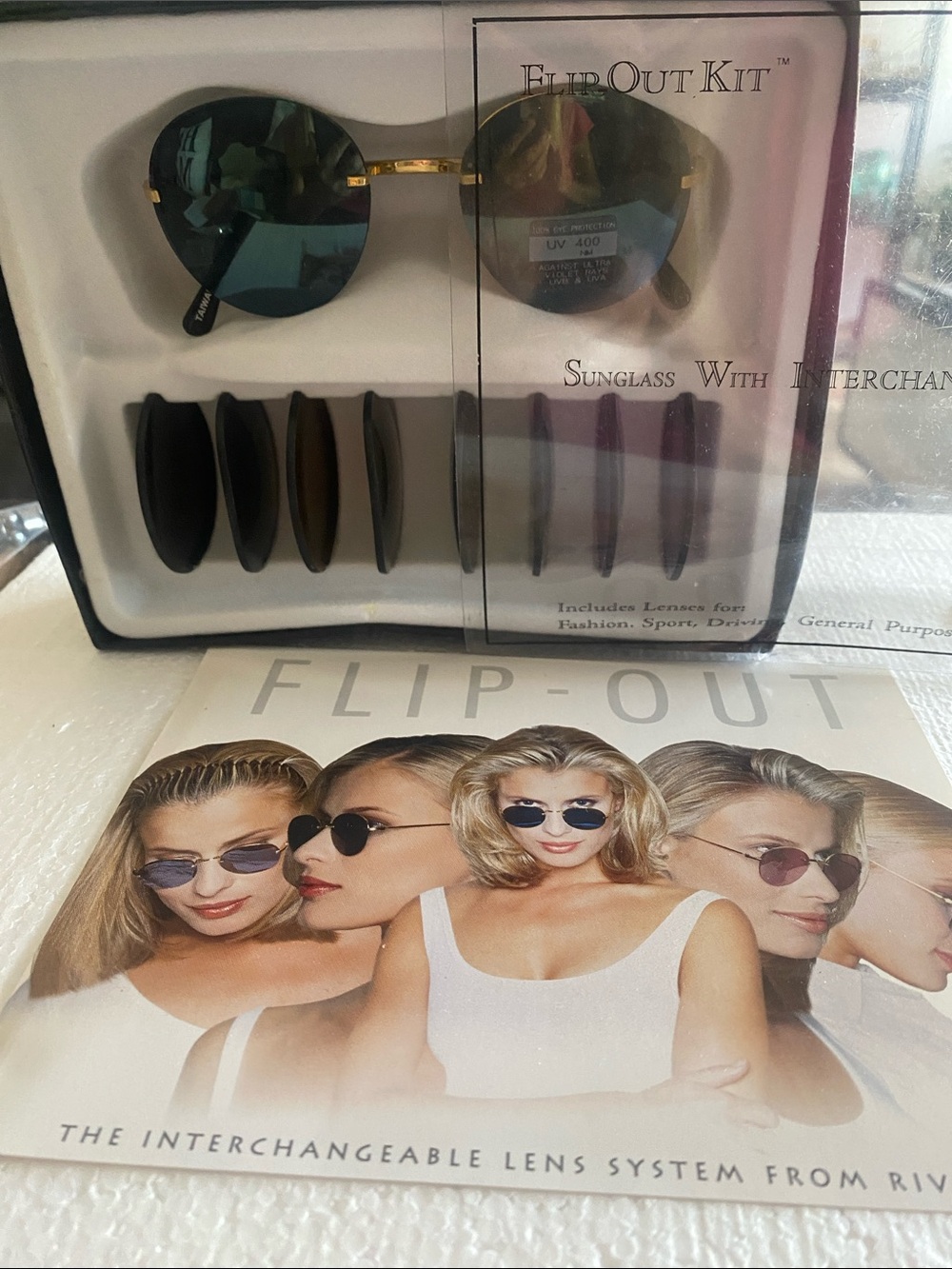 Vtg. New Riviera Flip-Out Sunglasses with Green Reflective Lenses